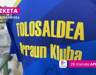 TAK-en kamiseta eta zapia